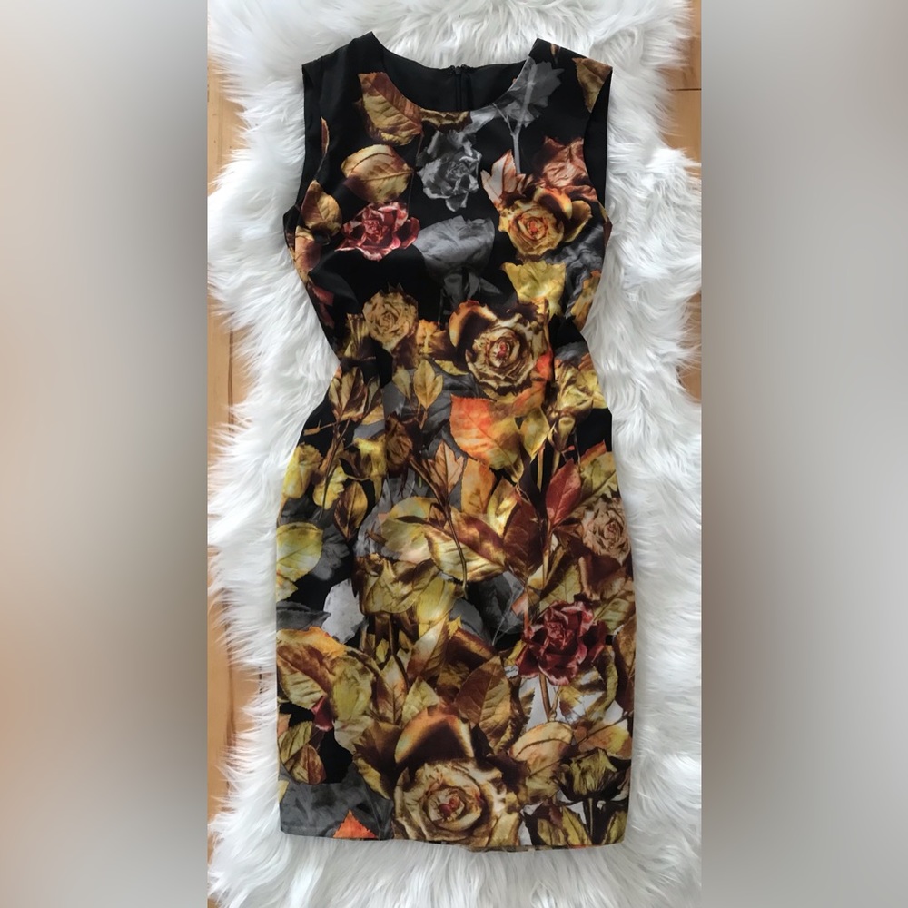 Floral Dress• Sleeveless • Tailor made dress • Size: 4